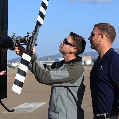 Pre flight inspection. Helicopter pilot training at Corporate Helicopters Flight Training Academy in San Diego, California.
